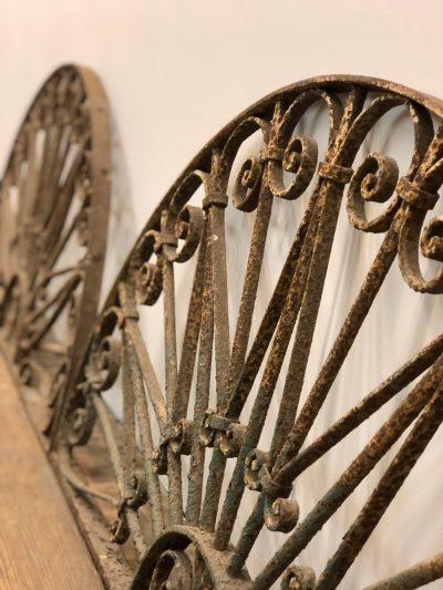 A Pair of Wrought Iron Fanlights