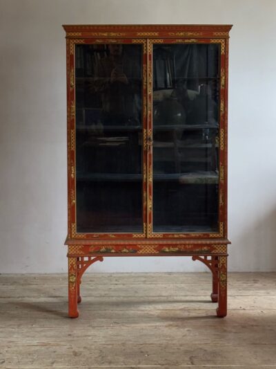 Red lacquered mahogany china cabinet