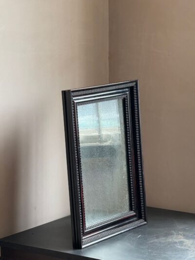 Ebonised ripple frame mirror